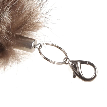 Raccoon Coat Tails Keychain